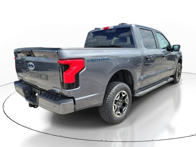 Used 2023 Ford F-150 Lightning XLT with VIN 1FTVW1EL4PWG58988 for sale in Miami, FL