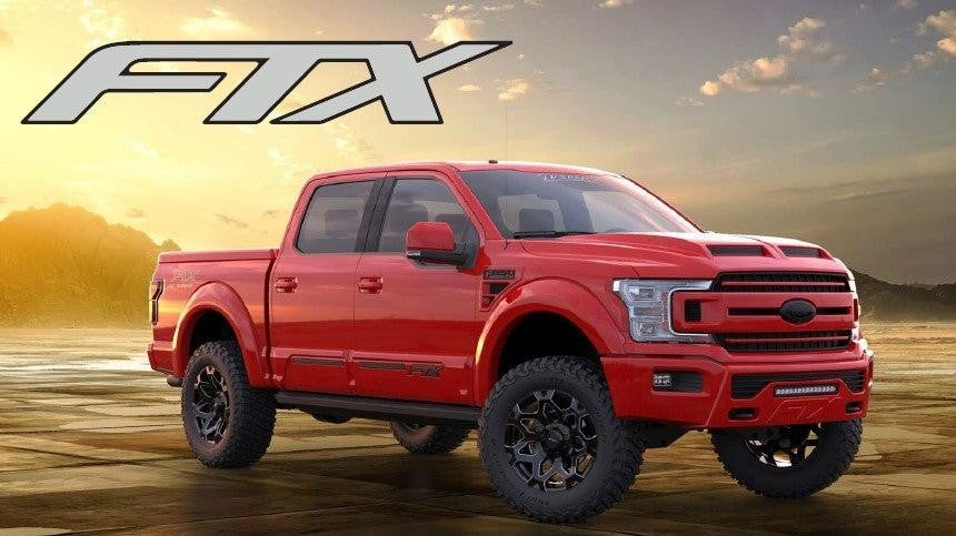 Red FTX Truck with beautiful orange background